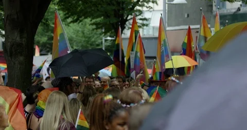 Slow Motion Pride Flags Waved And People Parading In Nottingham Walk Through Stock Footage 113527675
