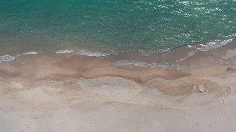 Slow-motion pristine tropical beach aerial top down Stock Footage 112702859