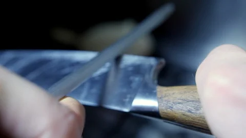 Slow motion Pro Chef sharpening knife with honing steel sharpener, commercial Stock Footage 86544114