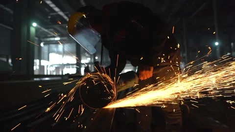 Slow motion. Professional male worker cutting metal with a grinding machine 스톡 동영상 213862292