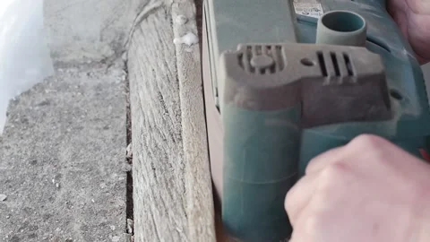 Slow motion: professional man carpenter using belt sander machine, polishing Stock Footage 152347715