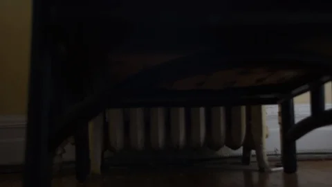 Slow motion pull away from empty chair Video stock 88976450