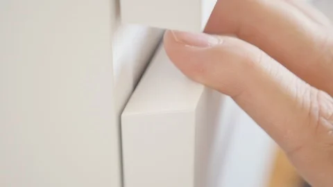 Slow motion pulling drawer of white cabinet FullHD video Stock Footage 118603018