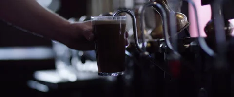 Slow motion pulling a pint of bitter Stock Footage 59946683