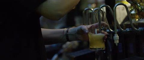 Slow motion pulling a pint Stock Footage 59947200