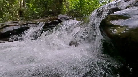 Slow motion, pure cleansing water, rushing torrents, wilderness sounds Stock Footage 312440083