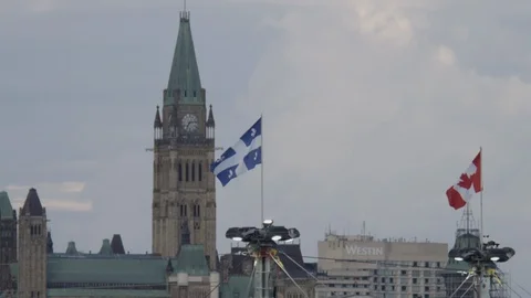Slow motion quebec and canada flags in parliament Stock Footage 114924794
