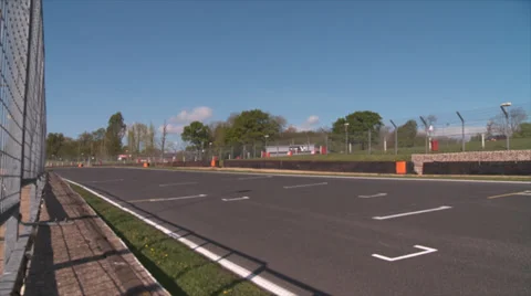 Slow motion racing from the pit lane Stock Footage 38072255