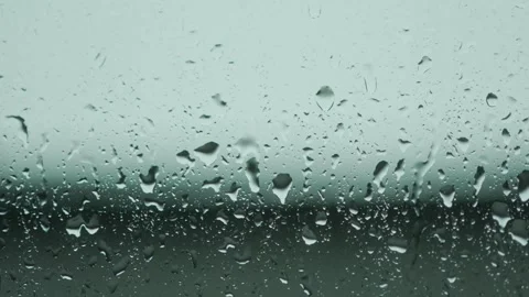 Slow Motion Rain on Car Window – Cinematic Overcast Mood Stock Footage 308397333