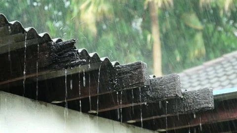 Slow motion rain down the roof Stock Footage 111498489