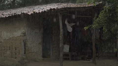 Slow Motion Rain Dropping from Palha Roof, Tabajaras Indigenous Village, Conde Stock Footage 320571340