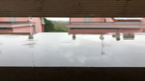 Slow motion of rain drops, close up view during the storm. Fall scenario Stock Footage 141207145