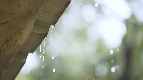 Slow motion, Rain drops from the eaves. Stock Footage 99223252
