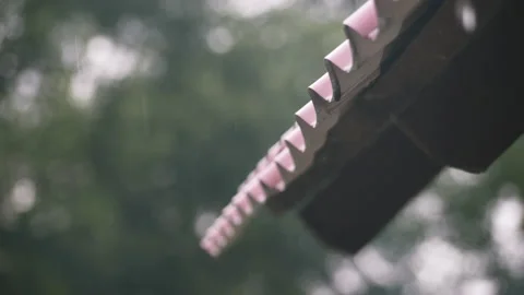 Slow motion Rain Drops Falling from haus rooftop Slow Rain Sky Drops Drizzle Stock Footage 229029956