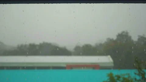 Slow motion rain falling and droplets on roof building is beuaty Stock Footage 113971072