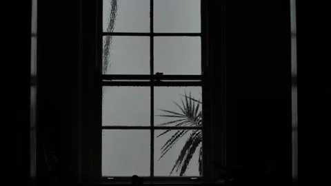 Slow motion rain hitting window and shadows 4K Stock Footage 274427270