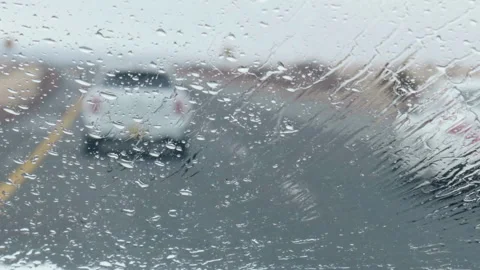 Slow Motion Rain On Windsheild While Driving Stock Footage 164423804