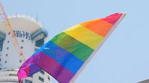 Slow Motion,  rainbow flag waving on during Annual Gay Pride Parade, Tel Avi 스톡 동영상 111037792