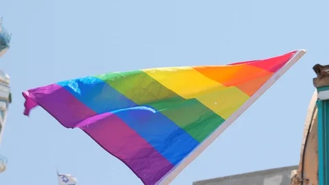 Slow Motion, rainbow flag waving on during Annual Gay Pride Parade, Tel Avi Vidéo 111040945