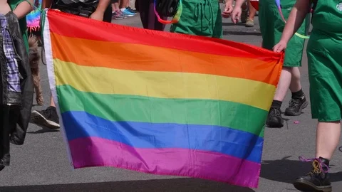 Slow Motion Rainbow Pride Flag, LGBT Homosexual Celebration Close Up Parade Stock Footage 100044768