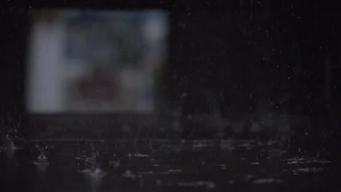 SLOW MOTION : Raindrop falling on ground Stock Footage 94907461