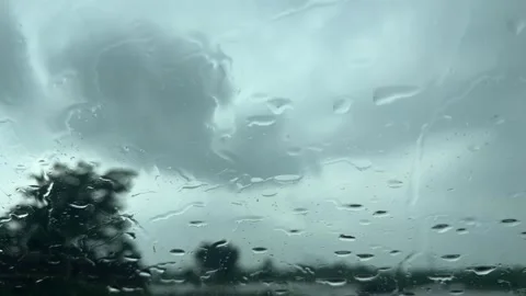 Slow Motion Raindrops on Car Windshield During Monsoon Storm Stock Footage 341717058