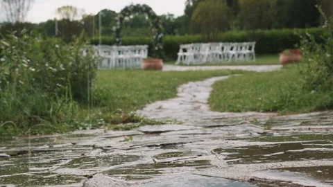 Slow motion. Raindrops fall to the ground. Summer Stock Footage 146157278