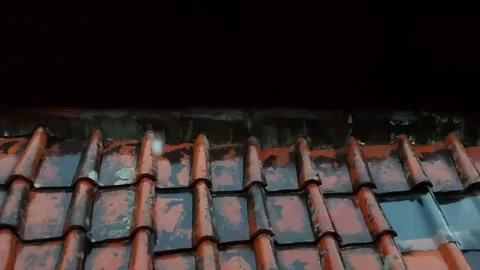 Slow Motion Raindrops Falling on the Roof Stock Footage 156293012