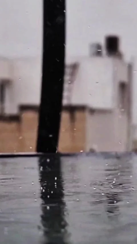 Slow Motion Rainfall Mesmerizing Raindrops Falling in Stunning Detail Stock Footage 285325562