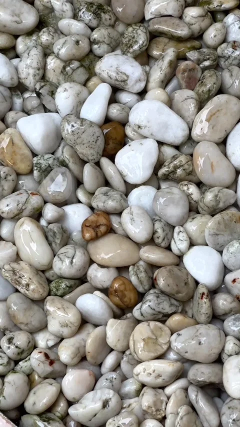 Slow motion of raining drop to white rock ground Stock Footage 320153549