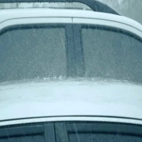 Slow motion Raining over the car roof Stock Footage 69347749