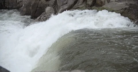 Slow motion rapids over rocks Great Falls Park Stock Footage 91906397