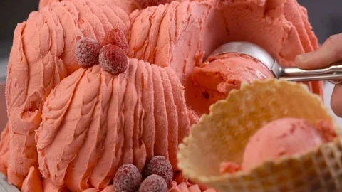 Slow motion of raspberry gelato ice cream being scooped Stock Footage 75515352