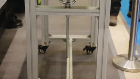 Slow motion of ready made plastic cup folling from line into container Stock Footage 107745517