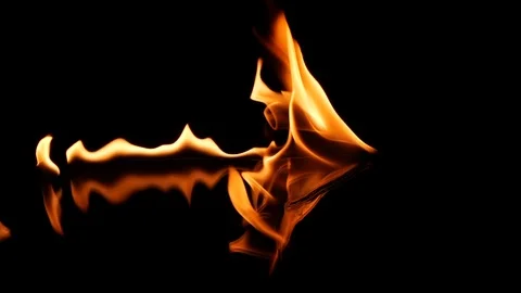 Slow motion of real fire flames danger sign igniting burning on black background Stock Footage 125560901