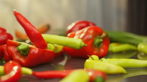 Slow Motion of Red Bell Pepper Falling on Table Vídeos de archivo 296362086