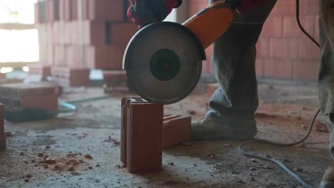 Slow Motion Red Brick Sawing with Circular Saw. Stock Footage 259394776