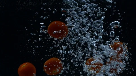 Slow motion of red cherry tomatoes Stock Footage 123348209