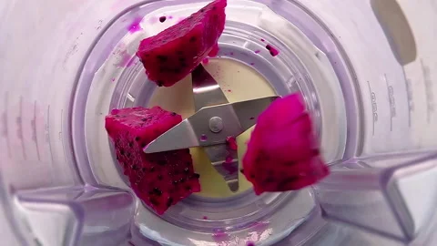 Slow motion of red dragon fruit into the Juice blender. Top view Stock Footage 139204827