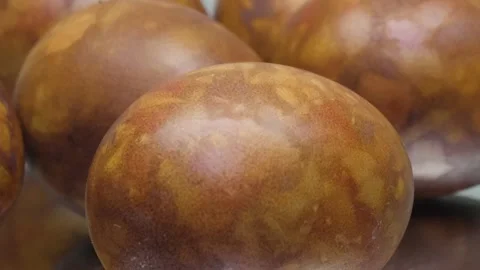 Slow motion red Easter eggs with marble pattern isolated on white background Stockbeeldmateriaal 197799417