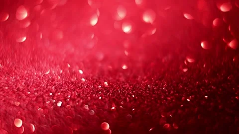 Slow-motion red glitter bokeh with soft focus shifts, capturing a magical Stock Footage 291891180