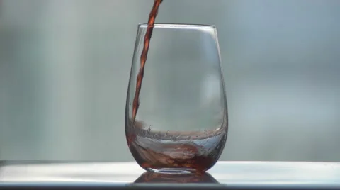 Slow Motion Red Wine Pour Into Wine Cup. Stock Footage 57283285