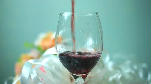 Slow motion red wine pouring on the the top view of the table Stock Footage 94018372
