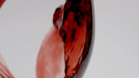 Slow motion red wine pouring into wine glass Stock Footage 108017530