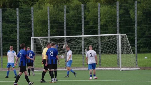Slow Motion, Referee awards a Direct Free Kick in pre-season friendly game Stock Footage 342336417