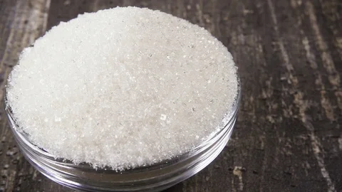 Slow motion refined sugar falls into the sugar close-up Video stock 95795153