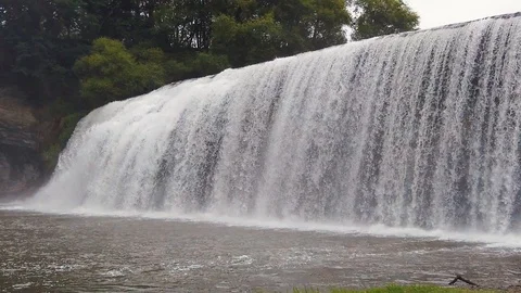 Slow motion Rere falls after rainfall. New Zealand Stock Footage 100659536