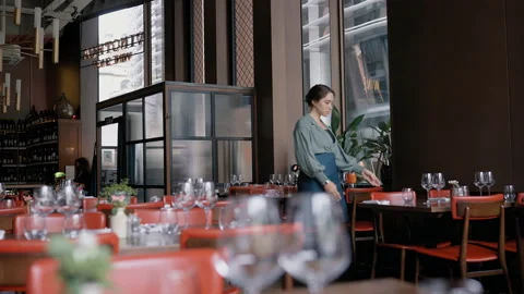 Slow motion of restaurant owner checking tables Stock Footage 159571455