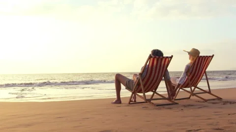 SLOW MOTION Retirement Vacation Concept, Happy Mature Retired Couple Enjoying Stock Footage