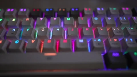 Slow motion RGB computer mechanical keyboard viewing footage Stock Footage 290947691